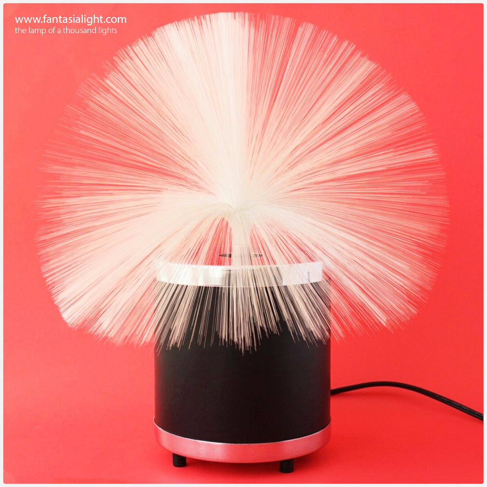 Fantasia Comet - Model 1000 - A simple yet classic tub Fantasia fiber optic lamp design with a black base and silver upper and end caps.