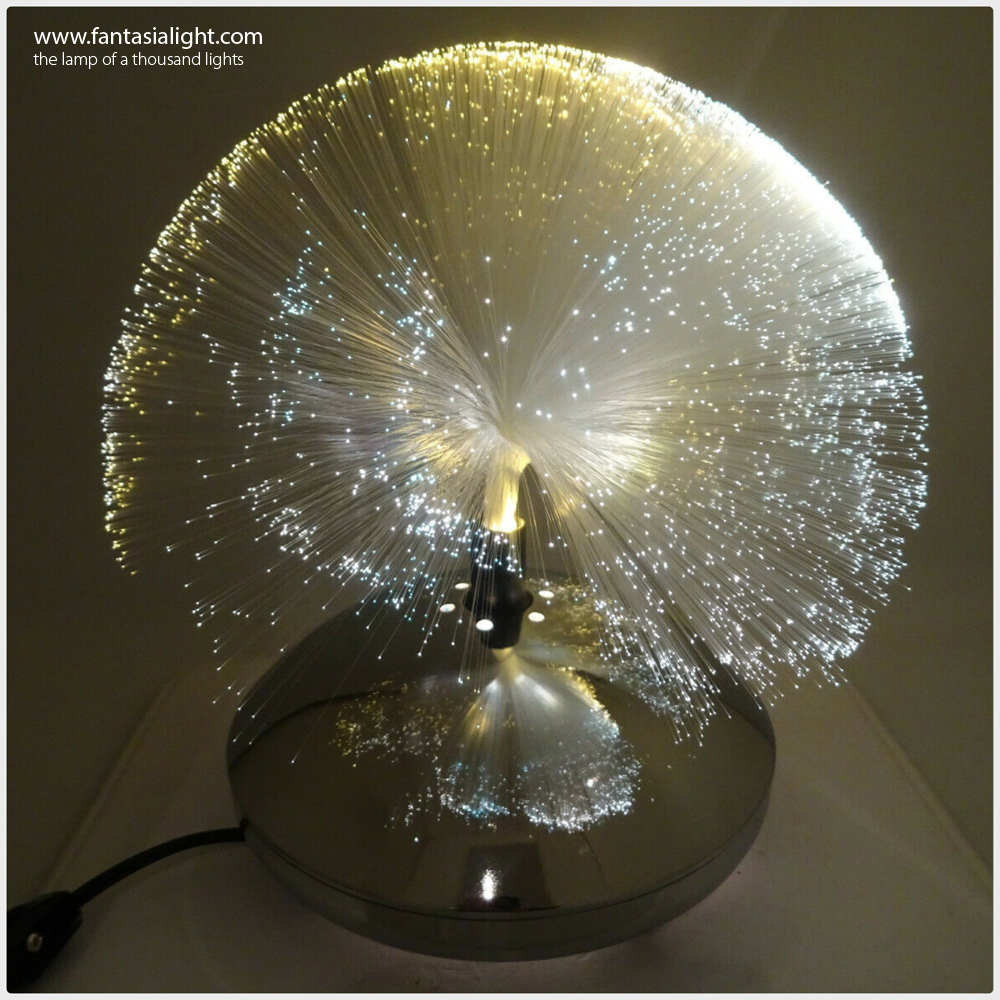 Fantasia Galaxy - Model 2001 - Just like a UFO, Galaxy by Fantasia places the spray first and the base of the lamp second to create a beautiful galaxy of light dots that just levitates off the surface of where it is placed upon. Model below produced by Vicon.