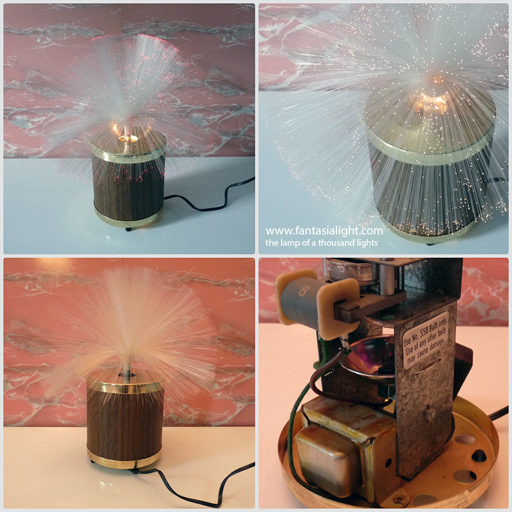 Fantasia Comet - Model 1000 - A simple yet classic tub Fantasia fiber optic lamp design with a black base and silver upper and end caps.