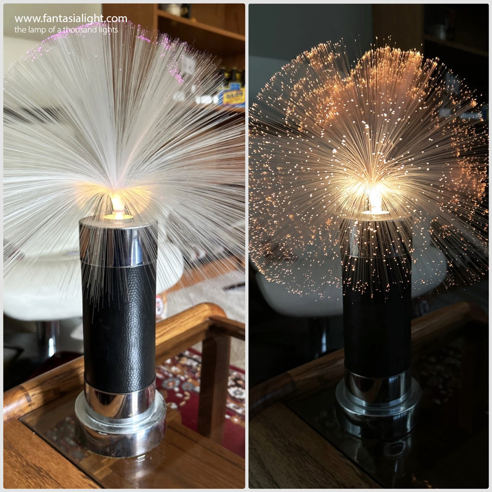 Firefly - Model 1101 -"Sparkling Colour in motion to compliment any decor" Black Leatherette Body, Chrome Trim 16" Tall Fantasia's first fiber optic lamp design. The lamp that started it all! This design was Fantasia's first design and saw many iterations.