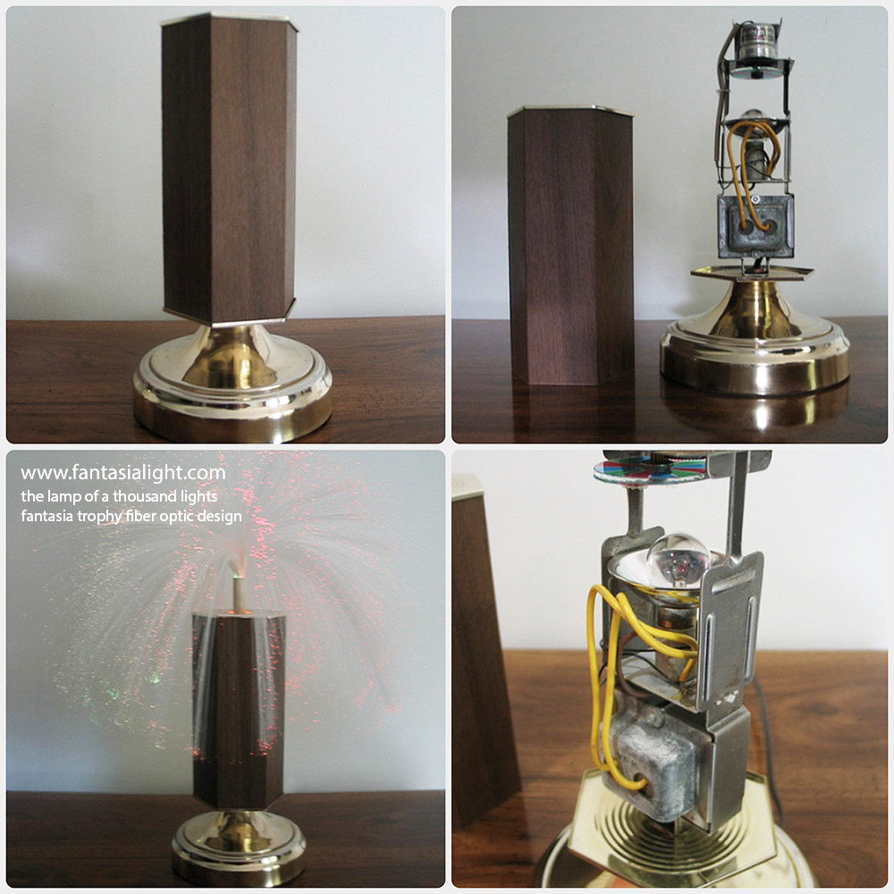 Trophy- Model 1103 - A similar concept to Fantasia Firefly, Fantasia's Trophy presents a trademark "sleeve-shaped" Fantasia fiber optic light design. Swapping the visual aesthetic of chrome and black seen in the highly popular Firefly design, Trophy has a wood veneer sleeve in a hexagon shape. The vintage Fantasia brochure describes this model as: "A possession to be proudly displayed and admired by all." Walnut Finish Body, Brass Tim, 18" Tall. Images below are the kind courtesy of Kristopher Steel.